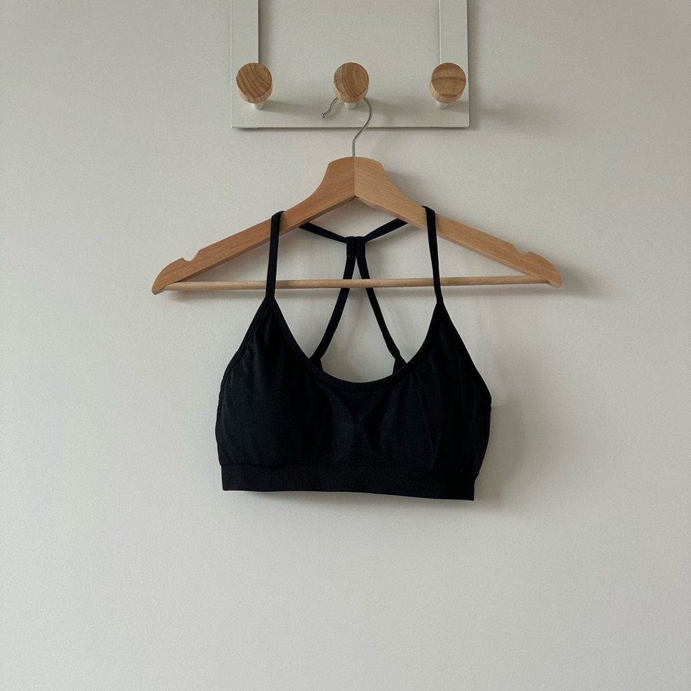 Fabletics black sports bra with intricate back